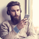 Image for article titled Entire Room Mentally Shaving Man's Facial Hair